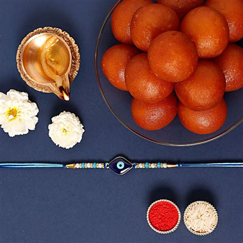 Sneh Ethnic Evil Eye Rakhi With 1 Kg Gulab Jamun Tin Uae Gift Sneh