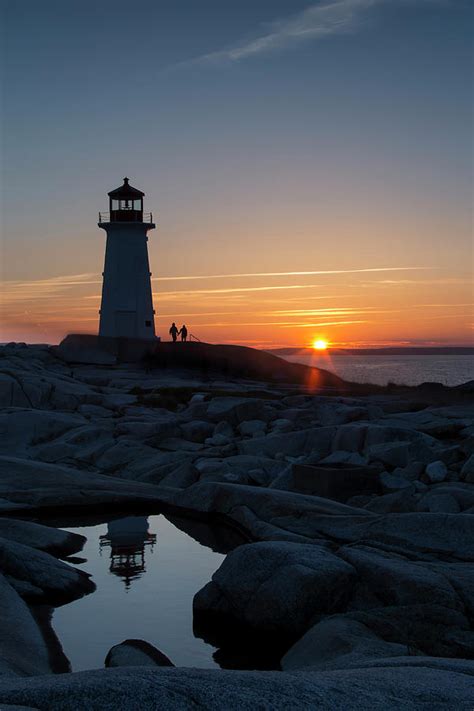 Peggys Point Lighthouse At Sunset Photograph By Robbie George