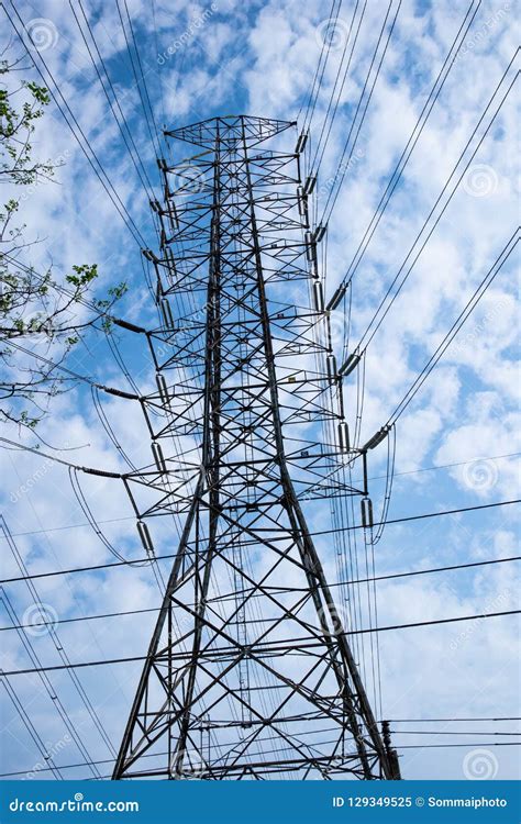 High Voltage Pole On Bluesky Background Energy Supply By Power Line