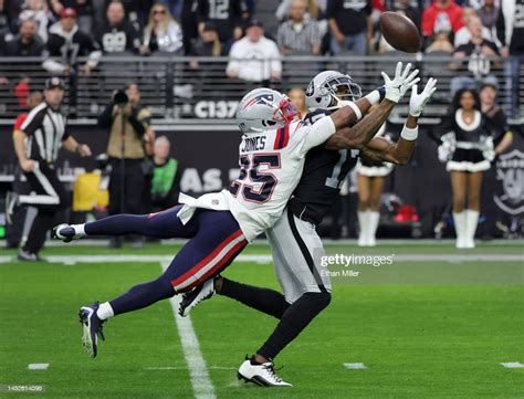 Cornerback Marcus Jones Of The New England Patriots Breaks Up A Pass