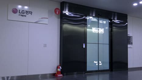 Transparent OLED Automatic Door OLED Signage LG Information Display