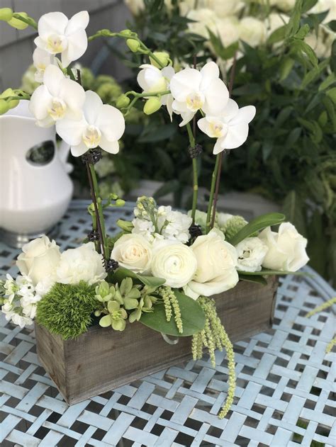 Rustic Garden Centerpiece With Orchids And Roses Orchid Centerpieces