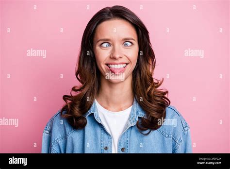 Photo Of Fooling Cheerful Cute Young Woman Stick Out Tongue Grimace