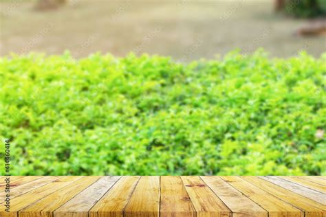 Shelf Of Brown Wood Plank Board With Blurred Green Rice Field Farm With