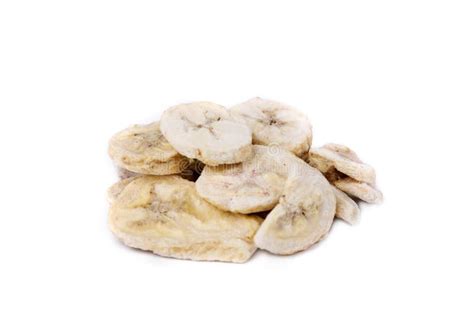 Freeze Dried Banana Pieces In A Heap Isolated Over White Stock Image