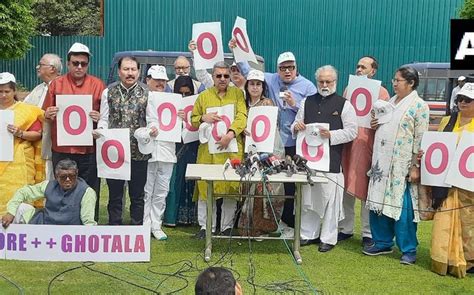 Opposition Leaders Hold Protest In Parliament House Complex Over Adani