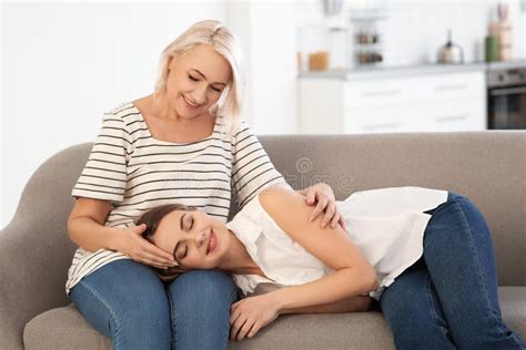 Young Woman Lying On Her Mother`s Lap Stock Image Image Of Happy