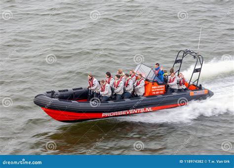 Water Sports By Speed Boat With People At High Speed Editorial