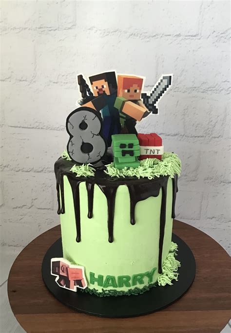 A Birthday Cake Decorated With Minecraft Characters