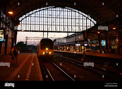 The train to Amsterdam entering the Haarlem railway station Stock Photo - Alamy