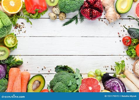 Fresh Vegetables And Fruits On A White Wooden Background Healthy