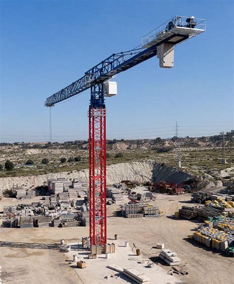 Grúa montada sobre camión TLS 80 32T Gruas Saez torre para obra