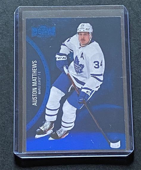 AUSTON MATTHEWS 2021 22 SKYBOX METAL UNIVERSE BLUE SPECTRUM PARALLEL