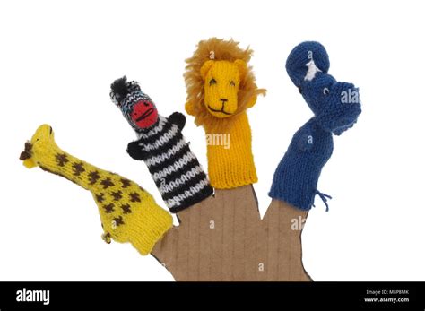 finger puppets on white background Stock Photo - Alamy