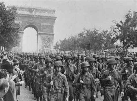 American Soldiers Marching Down The Champs Elysées After The Liberation