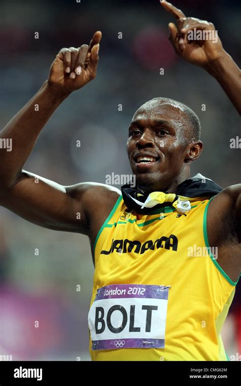 USAIN BOLT CELEBRATES Stock Photo - Alamy