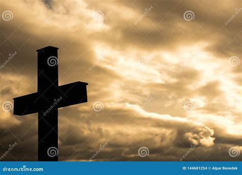 Simple Wood Catholic Cross Silhouette, Dramatic Orange Storm Clouds in ...