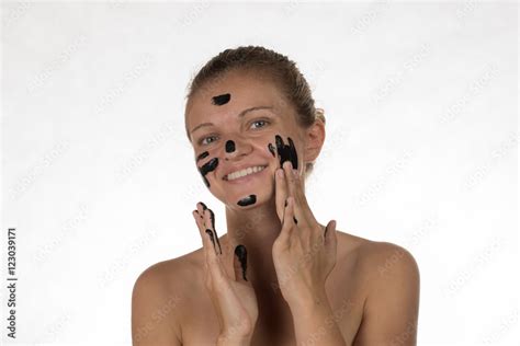 Happy beautiful girl with acne on a white background in a cosmet Stock ...