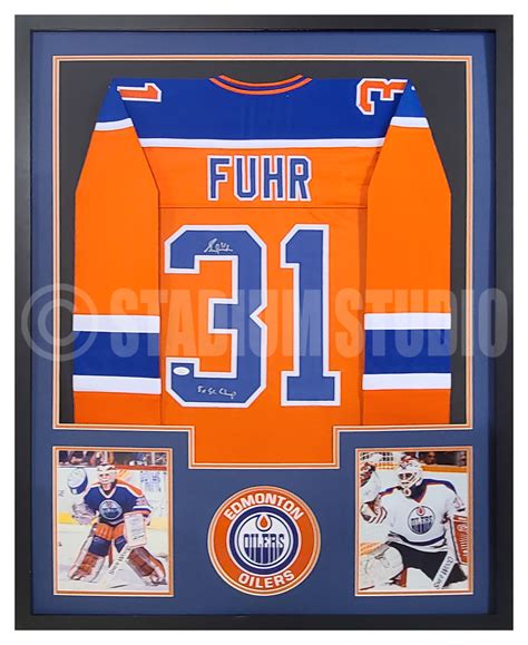 Grant Fuhr Autographed Framed Oilers Orange Jersey - The Stadium Studio