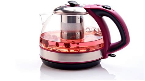 Premium Photo Glass Tea Pot Filled With Green Tea