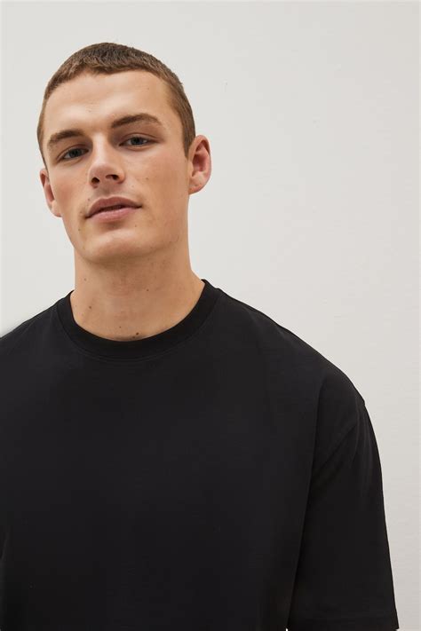 Buy Black Relaxed Fit 100 Cotton Essential Regular Crew Neck T Shirt From The Next Uk Online Shop