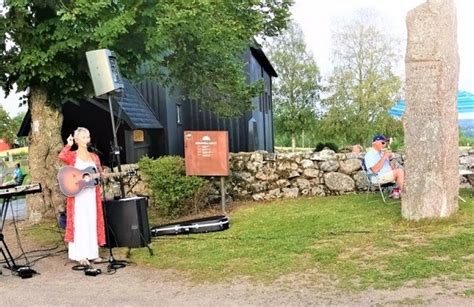 In Front Of The Old Stave Church Of Hoyjord