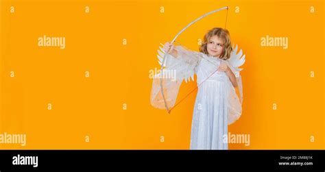 Angel child shoots a love arrow from a bow on Valentines Day. Angel child. Banner design, poster ...