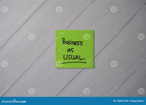 Business As Usual Text On Sticky Notes With Office Desk Stock Image