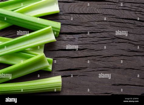 Pile of celery ribs isolated on white background Stock Photo - Alamy