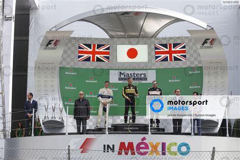 Podium L To R Second Placed Aaron Scott GBR Race Winner Katsuaki