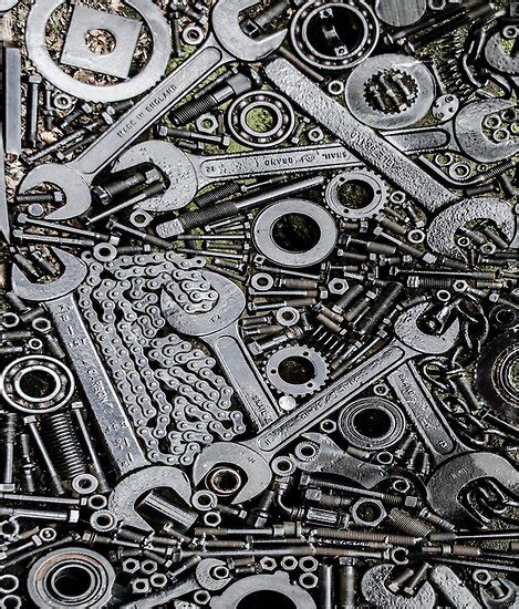 Many Different Types Of Wrenches And Nuts On A Black Surface With White