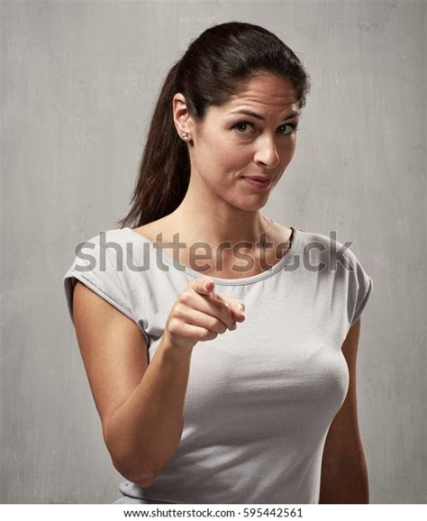 Woman Pointing Camera Stock Photo (Edit Now) 595442561