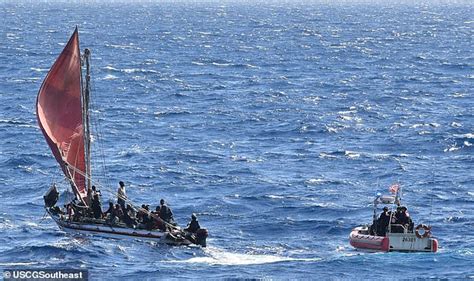 Moment US Coast Guard Intercepted Overcrowded Boat Off The Bahamas With