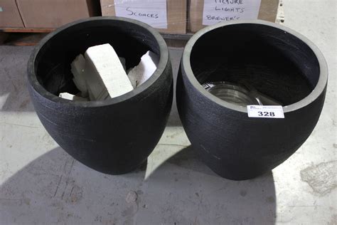 PAIR OF LARGE BLACK PLANTERS - Able Auctions