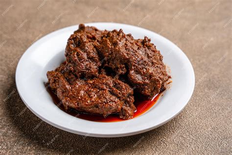 Premium Photo Beef Rendang Is A Minang Dish Originating From The