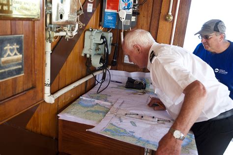 Captain Roy Swan Plotting Course Aboard The Historic Steam Tug William