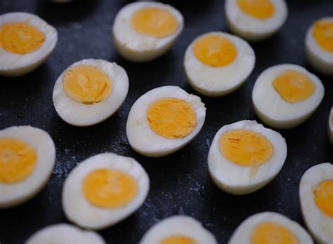 Premium Photo Many Halves Of Boiled Chicken Eggs Lying On Table