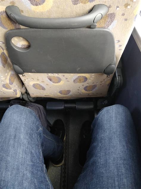 Actual legroom in an older tour bus is rare so this is amazing. : r/tall