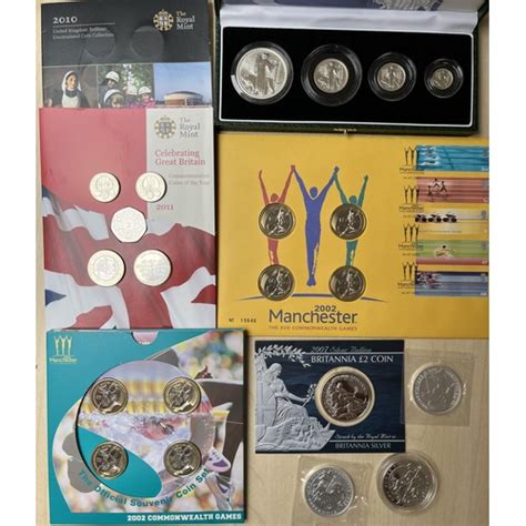 A Collection Of Uk Qeii Coins Including Uncirculated Flat Packs Coin