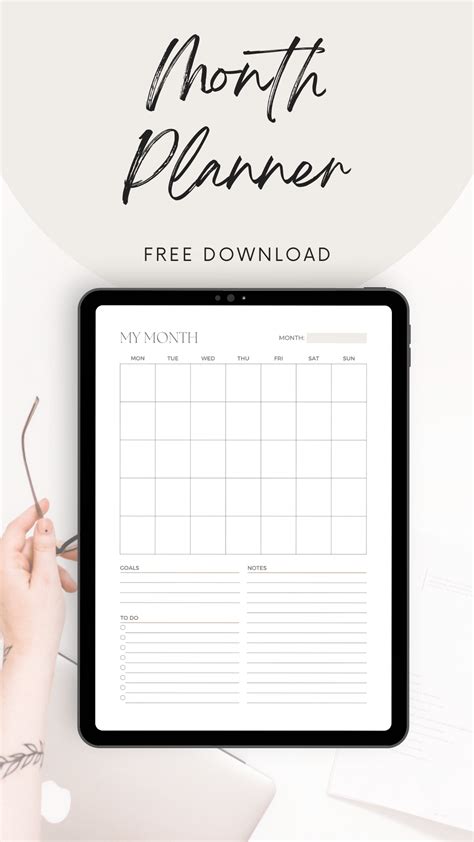 a tablet with the text free printable month planner on it and a woman's ...