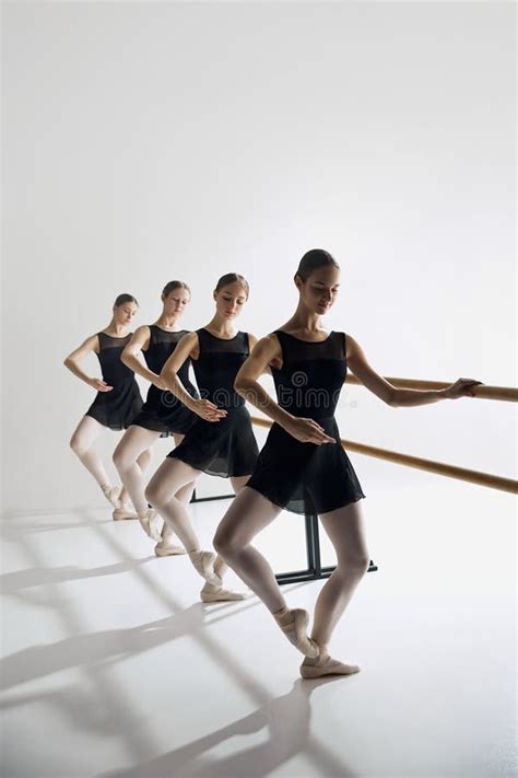 Dynamic Ballet Sequence Elegant Teen Girls Ballet Dancers Standing At