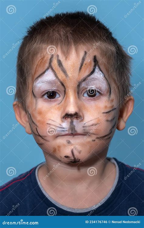 Children Face Painting Boy Painted As Tiger Or Ferocious Lion By Make