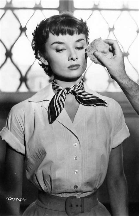 Director William Wyler Touches Up Audrey Hepburns Makeup On The Set Of