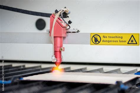 Laser CNC cutting wood. Modern machine industrial technology Stock ...