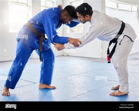 Karate Martial Arts And Men Fighting In Dojo For Sports And Health