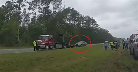 Car Launches Off Tow Truck Ramp Due To A Distracted Driver Wtf Video