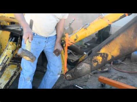 Removing The Hydraulic Cylinders From Back Hoe YouTube