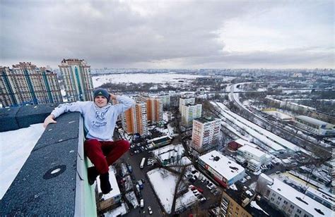 Dizzying Photos Of Ukrainian Daredevil Hanging From Tall Buildings