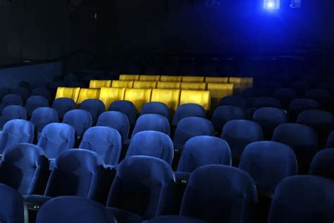 Movie Theater with empty seats and projector Stock Photo by ©fergregory ...