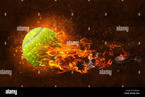 Tennis Ball In Fire Stock Photo Alamy